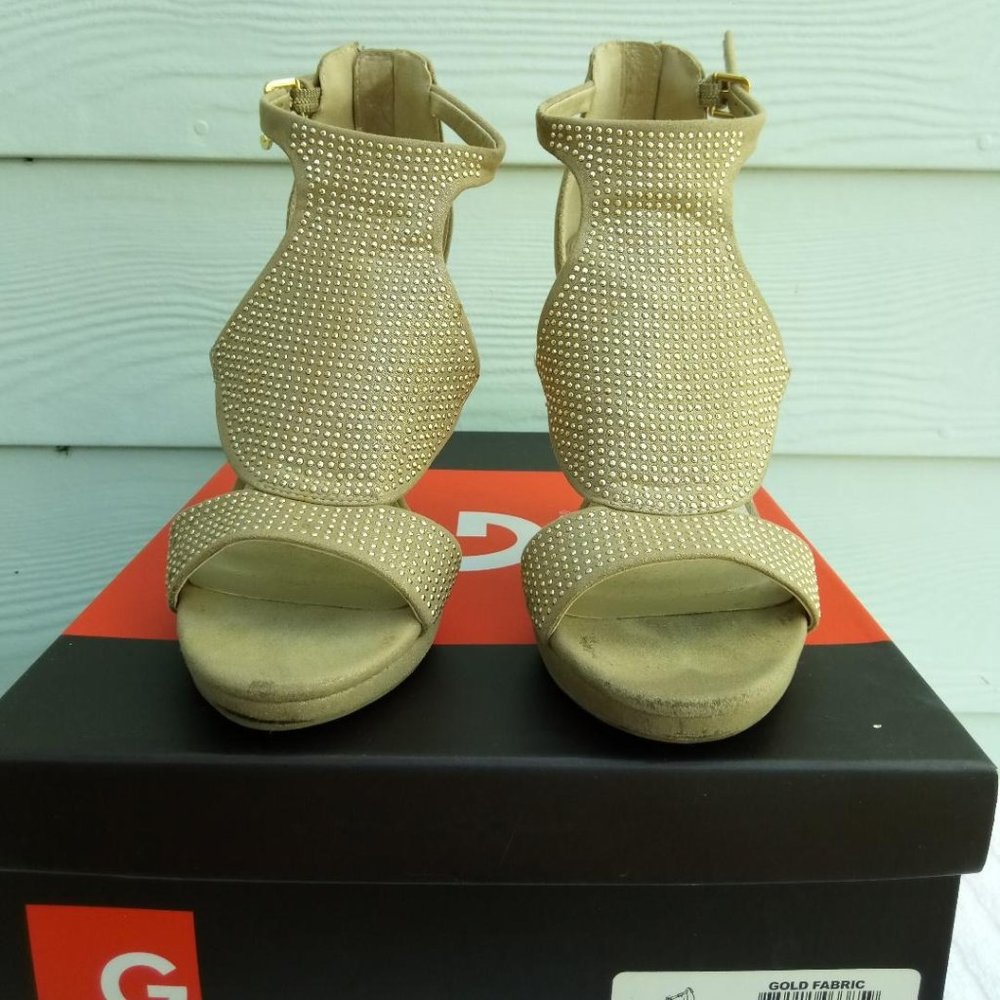 Size 6M G By Guess Glamo peep toe heel. Gold fabric. Platform heels